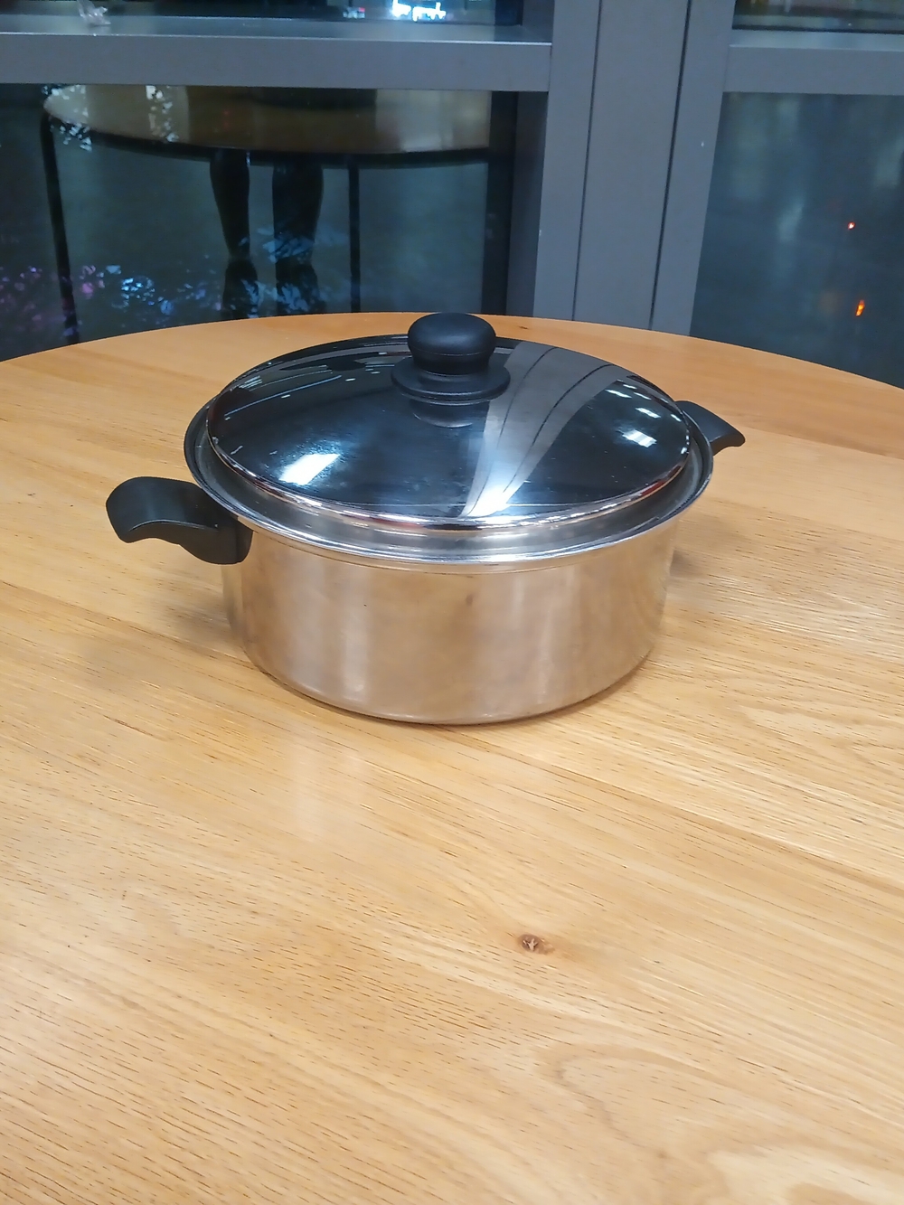 Stainless Steel Covered  six quart Dutch oven pot with Black Handles
